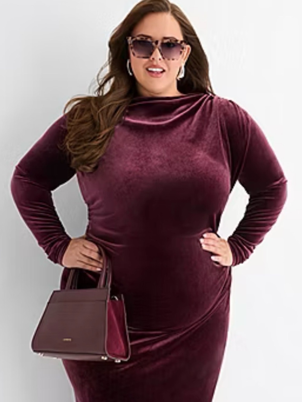 Ashley Graham Long Sleeve Ruched Velvet Midi Dress in Wine
